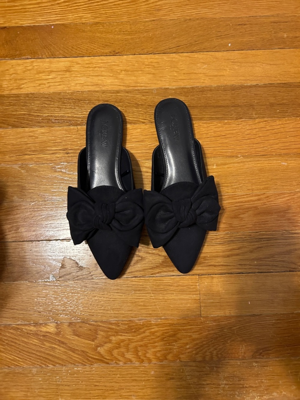 navy Pointed Bow Slip-On Flats - Women
J Crew  size 6